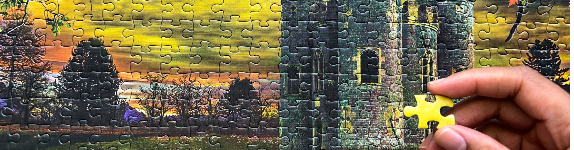 A Flipsi puzzle mid-build on a warm wooden table